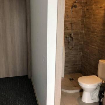 Фото номера Стандартный двухместный люкс с 1 кроватью Гостевой дом Izabelės apartamentai г. Паланга 10