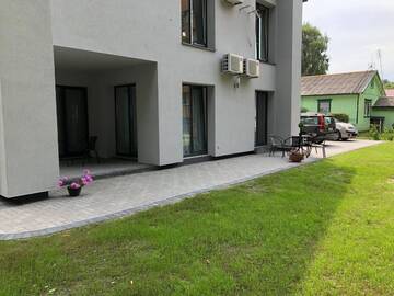 Фото номера Четырехместный номер с террасой Гостевой дом Izabelės apartamentai г. Паланга 8