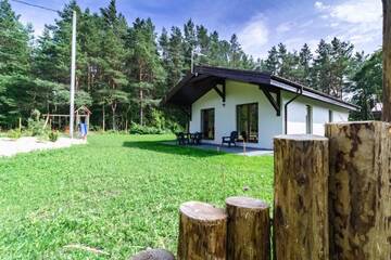 Фото номера Дом с 3 спальнями Дома для отпуска Miško Kopos г. Паланга 4