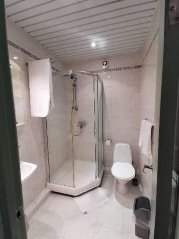 Фото номера Четырехместный номер с ванной комнатой Отель B45apartments г. Паланга 4