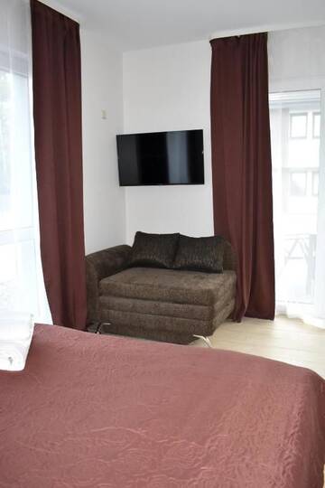 Фото номера Номер-студио с террасой Апартаменты EGITOS apartamentai г. Паланга 7