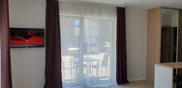 Фото номера Номер-студио с террасой Апартаменты EGITOS apartamentai г. Паланга 10