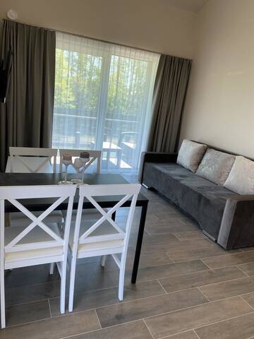 Фото номера Четырехместный номер с балконом Апарт-отели SKY Villa г. Паланга 7