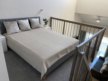 Фото номера Четырехместный номер с балконом Апарт-отели SKY Villa г. Паланга 8