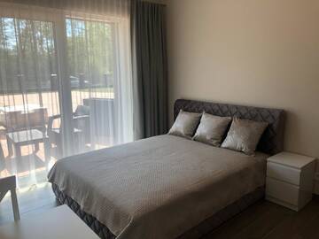 Фото номера Двухместный номер с 1 кроватью и террасой Апарт-отели SKY Villa г. Паланга 6