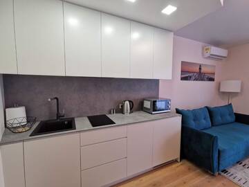 Фото номера Апартаменты с 1 спальней Апартаменты Cozy Palanga г. Паланга 31