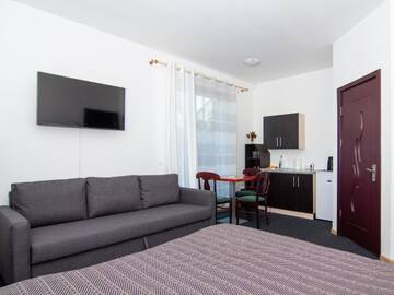 Фото номера Четырехместный номер эконом-класса Апартаменты Maironio 23 apartments г. Паланга 2