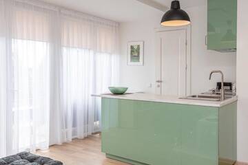 Фото номера Четырехместный номер с балконом Апарт-отели Rainbow Palanga г. Паланга 25