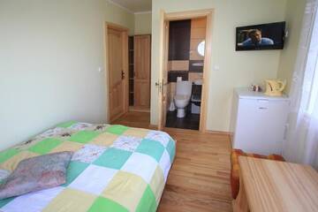 Фото номера Двухместный номер с 1 кроватью Апартаменты Vila Arona г. Паланга 4