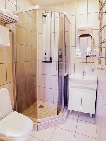 Фото номера Улучшенный двухместный номер с 1 кроватью Отель Senoji Hansa Hotel г. Паланга 11