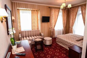 Фото номера Улучшенный двухместный номер с 1 кроватью и балконом Отель Senoji Hansa Hotel г. Паланга 10