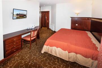 Фото номера Стандартный двухместный номер с 1 кроватью Проживание в семье Guest House &amp; Villa Astoma г. Паланга 3