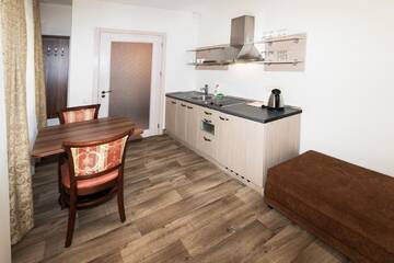 Фото номера Номер-студио с террасой Проживание в семье Guest House &amp; Villa Astoma г. Паланга 7