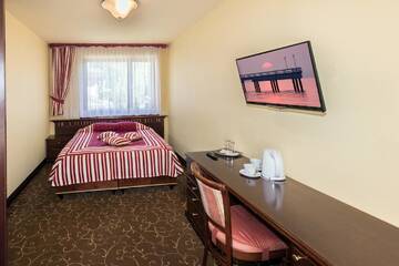 Фото номера Улучшенный двухместный номер с 1 кроватью Проживание в семье Guest House &amp; Villa Astoma г. Паланга 5
