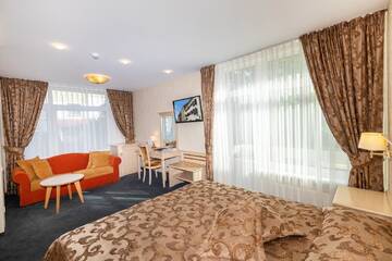 Фото номера Люкс с 2 спальнями Проживание в семье Guest House &amp; Villa Astoma г. Паланга 5
