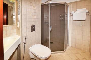 Фото номера Улучшенный трехместный номер Проживание в семье Guest House &amp; Villa Astoma г. Паланга 4
