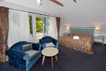 Фото номера Люкс с 2 спальнями Проживание в семье Guest House &amp; Villa Astoma г. Паланга 3