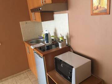 Фото номера Трехместный номер с 1 спальней и балконом Гостевой дом Aitvaras г. Паланга 6
