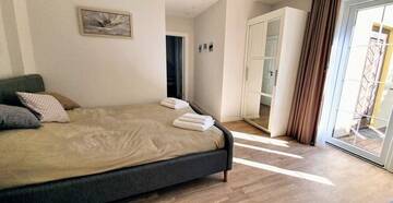 Фото номера Апартаменты с 2 спальнями Апартаменты Apartamentai Gastrolės г. Паланга 5