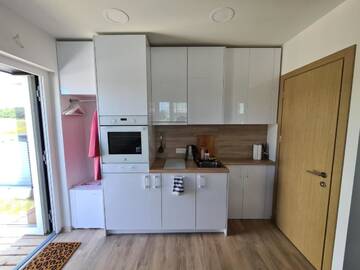 Фото номера Апартаменты с террасой Апартаменты Vaivorykštės 7D apartamentai (su baseinu) г. Паланга 8