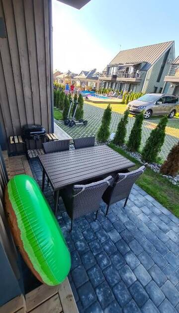 Фото номера Апартаменты с террасой Апартаменты Vaivorykštės 7D apartamentai (su baseinu) г. Паланга 21