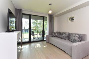 Фото номера Апартаменты с 1 спальней Апартаменты Cuprum Apartaments г. Паланга 7