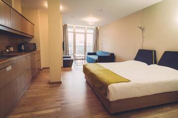 Фото номера Апартаменты-студио с доступом в спа-центр по утрам Отель Amberton Green Apartments Palanga г. Паланга 9