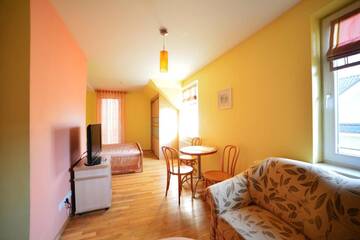 Фото номера Семейный номер с дополнительной кроватью Гостевой дом Birutes Apartments г. Паланга 2