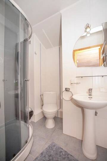 Фото номера Большой четырехместный номер Апартаменты Holiday Palanga Sea Side г. Паланга 7