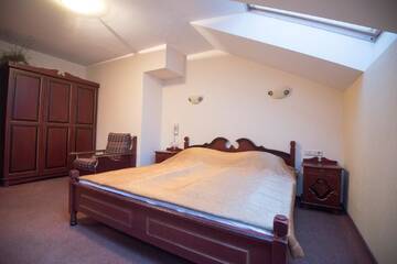 Фото номера Двухместный номер с 1 кроватью Гостевой дом Guest House Lotus г. Паланга 5