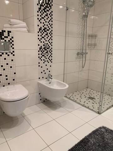 Фото номера Апартаменты с балконом Апартаменты Arunes Apartments - Daukanto г. Паланга 44