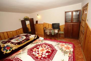 Фото номера Четырехместный номер с общей ванной комнатой - R3 Апартаменты Vila Pas Justiną г. Паланга 7