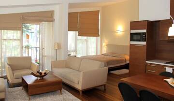 Фото номера Номер-студио Апартаменты Jūros Apartamentai г. Паланга 4