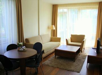Фото номера Апартаменты с балконом Апартаменты Jūros Apartamentai г. Паланга 9