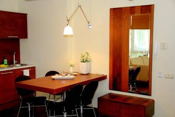 Фото номера Номер-студио Апартаменты Jūros Apartamentai г. Паланга 9