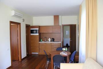 Фото номера Апартаменты с балконом Апартаменты Jūros Apartamentai г. Паланга 6