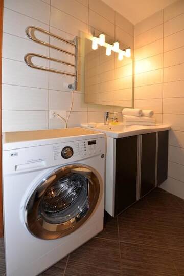 Фото номера Апартаменты с 2 спальнями и террасой Апартаменты Arunes Apartments г. Паланга 26