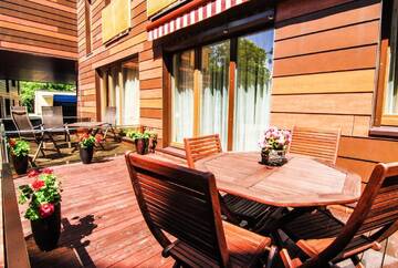Фото номера Стандартные апартаменты с 2 спальнями и террасой Апартаменты Arunes Apartments г. Паланга 2