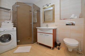 Фото номера Апартаменты с 1 спальней и балконом Апартаменты Arunes Apartments г. Паланга 9