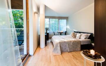 Фото номера Стандартный двухместный номер с 1 кроватью Апартаменты Apartamentai Tylios pušys г. Паланга 3