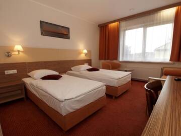 Фото номера Двухместный номер с 2 отдельными кроватями Отель Info Hotel г. Паланга 3