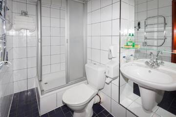 Фото номера Улучшенный двухместный номер с 1 кроватью или 2 отдельными кроватями Отель Tauras Center Hotel г. Паланга 8