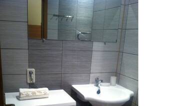 Фото номера Апартаменты с 1 спальней Апартаменты Isabela Apartments г. Паланга 5
